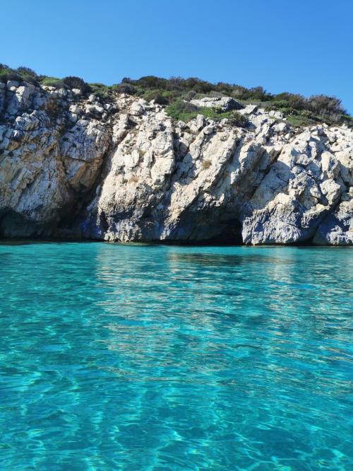 Cave and crystal clear sea