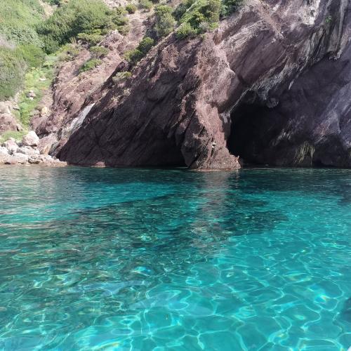 Cave and crystal clear sea