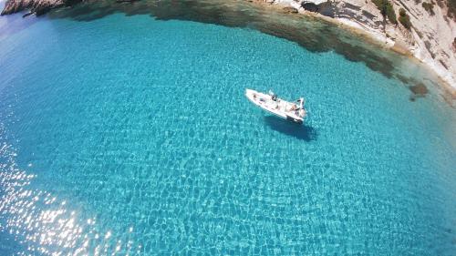 <p>Rubber boat in the crystal clear sea of Sant'Antioco<br></p><p><br></p>
