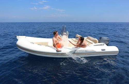 Couple aboard an inflatable boat