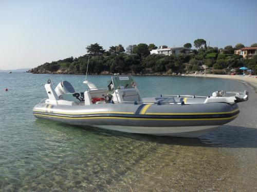 Rubber boat in Cala Sassari