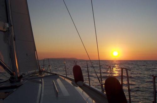 Sunset aboard a sailboat