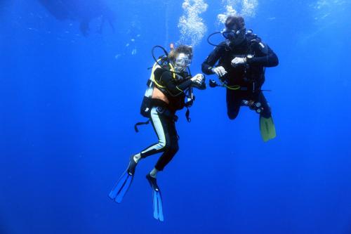 Snorkeling hiker with guide 