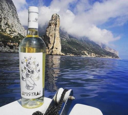 Bottle of wine on a boat in Cala Goloritzé