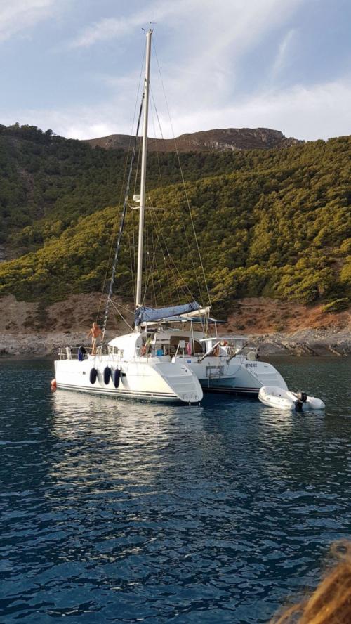 Catamaran with tender docked in the La Maddalena Archipelago
