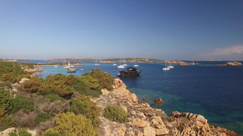 Motor ship in La Maddalena Archipel during daily tour